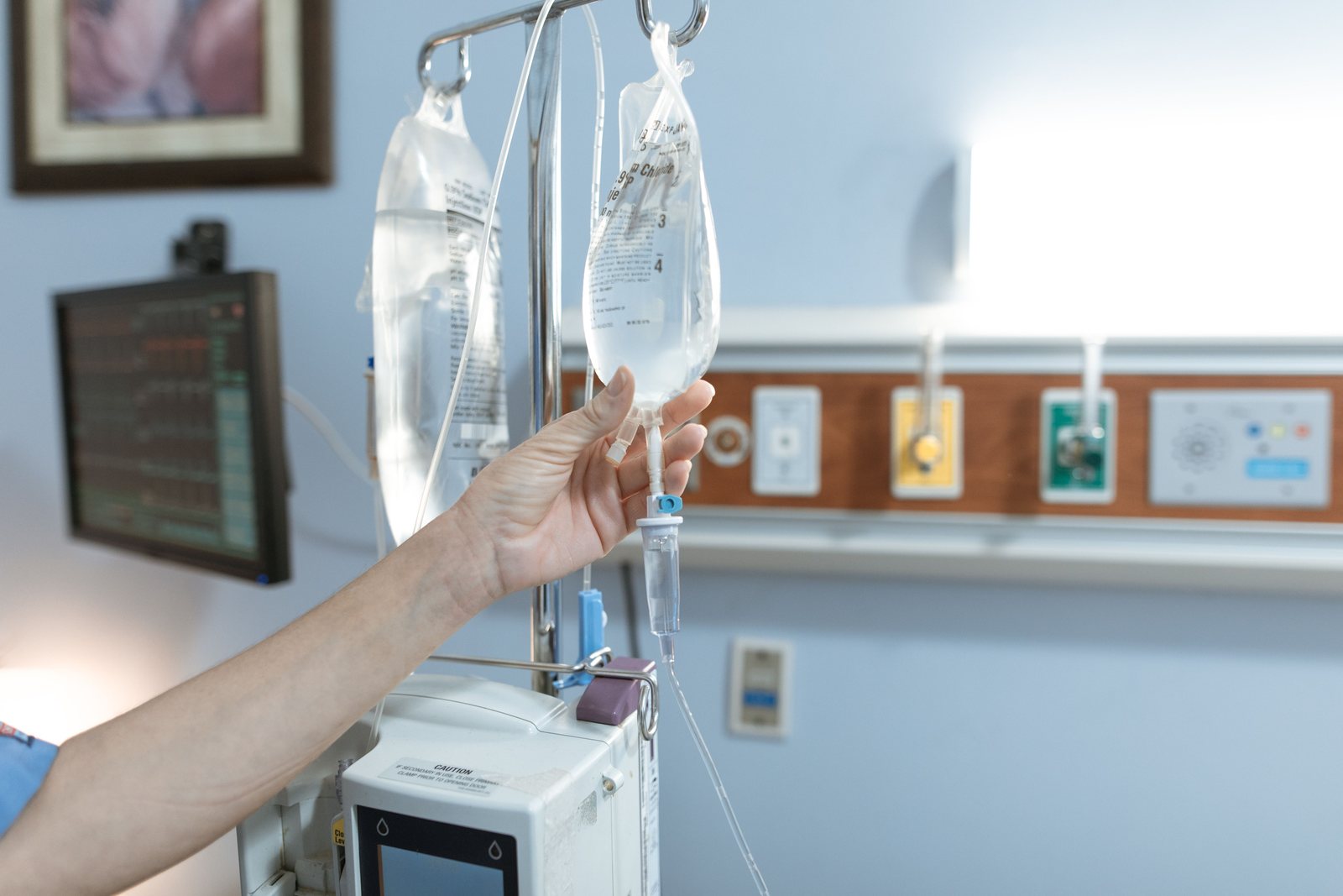 An intravenous bag hanging on a stand