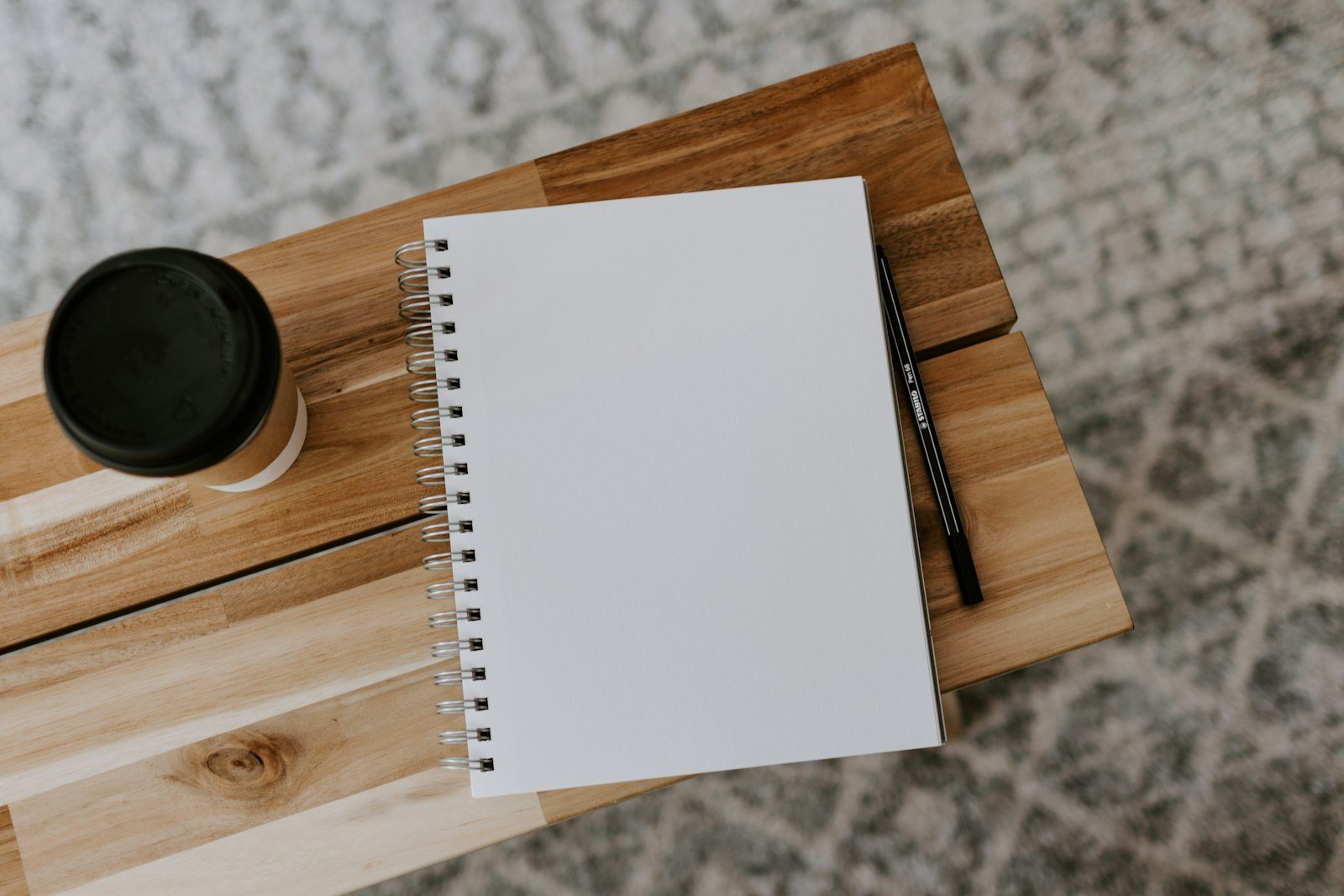 Handwritten notes on a notepad
