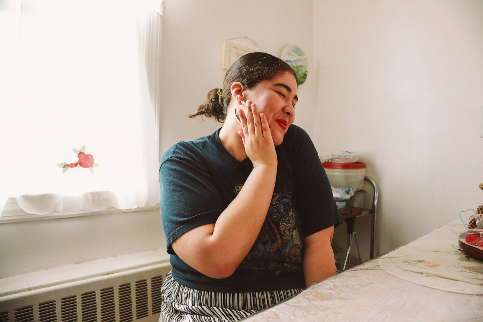 A person coughing at home