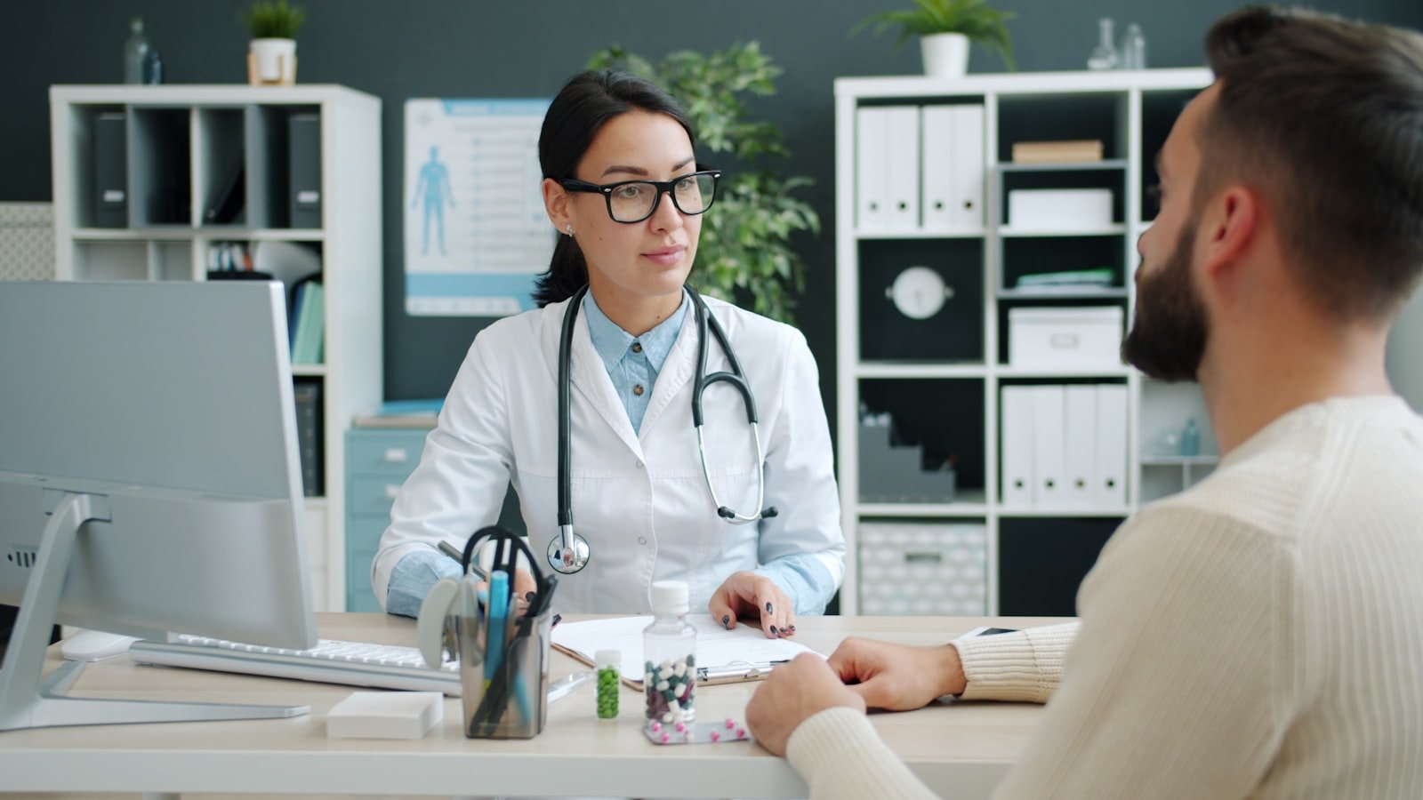 A clinician carrying out a health check during screening