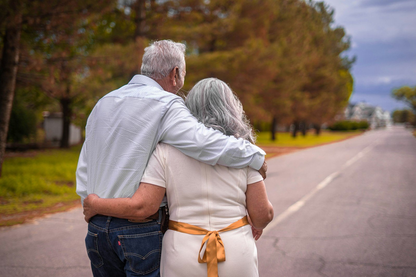 An older couple walking outdoors