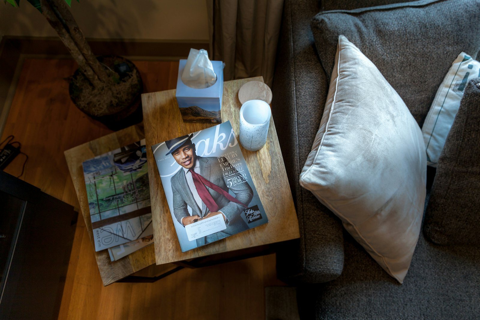 Tissues and a mug on a side table
