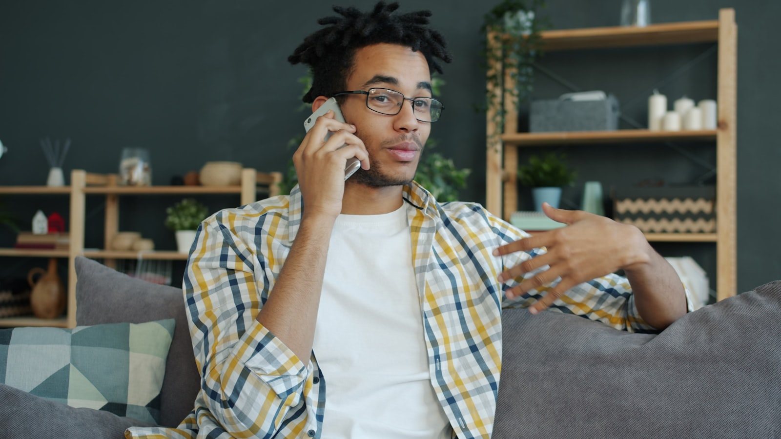 A person making a telephone call at home