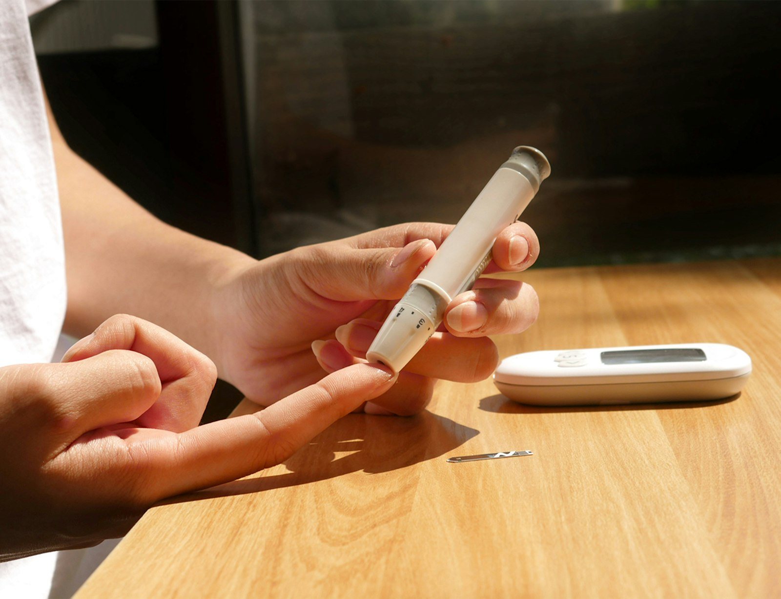 A blood glucose meter and testing supplies
