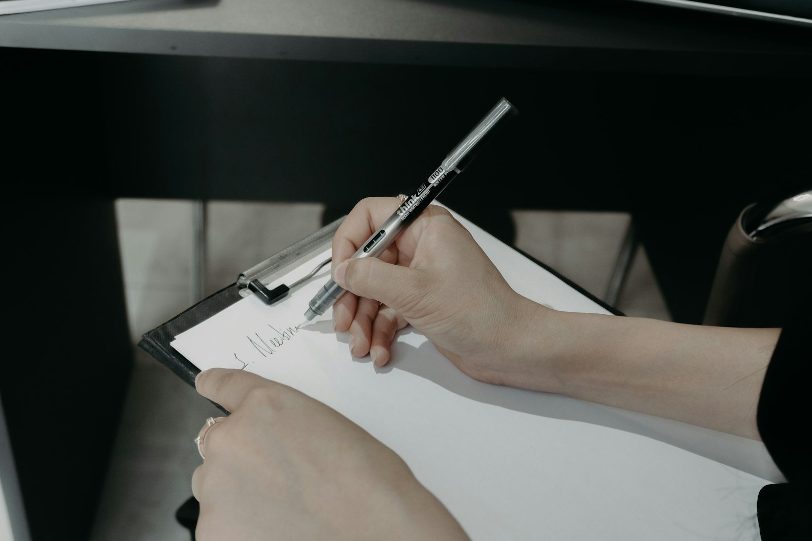 A form being filled in on a clipboard