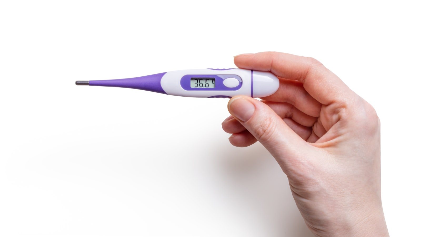 A thermometer being read at home