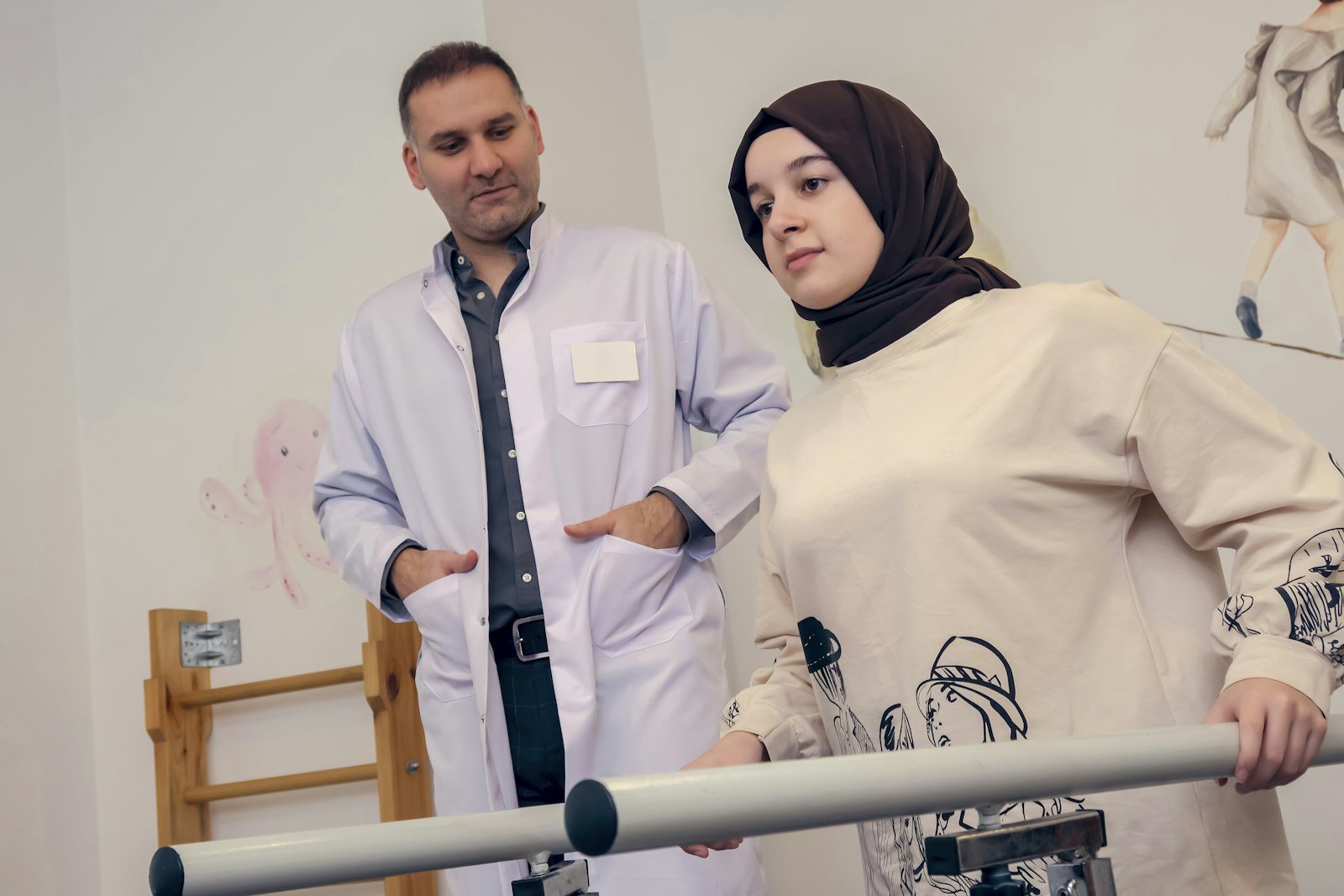 A clinician with a patient in a rehabilitation room